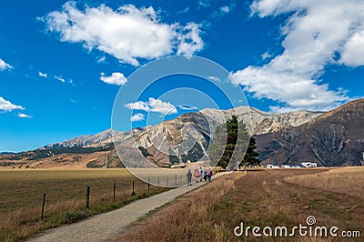 Tourists visiting Castle Hill in Southern Alps, Arthur's Pass, South Island of New Zealand Editorial Stock Photo